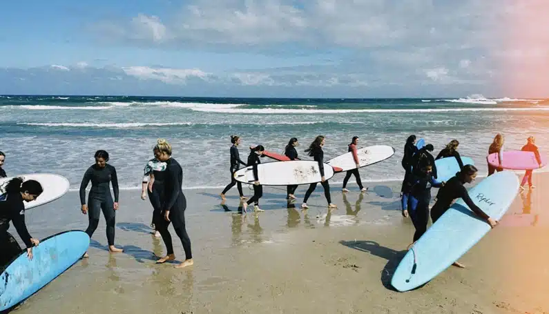 Girls surfing camp with csalt